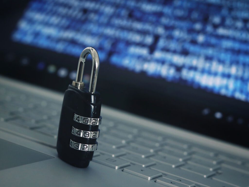 lock on laptop representing cybersecurity