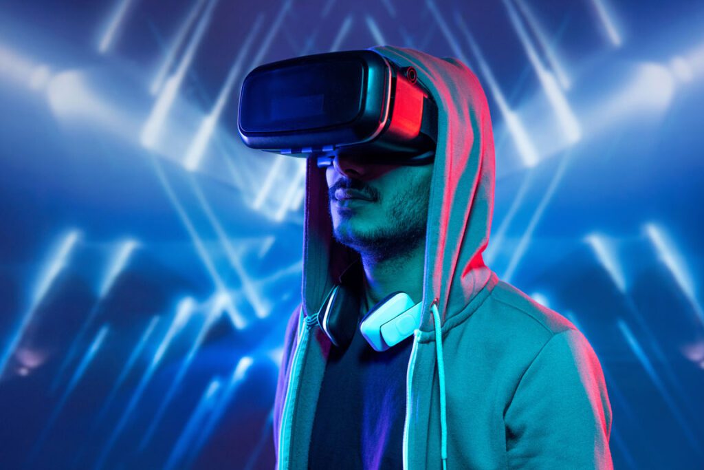 young male wearing virtual reality goggles